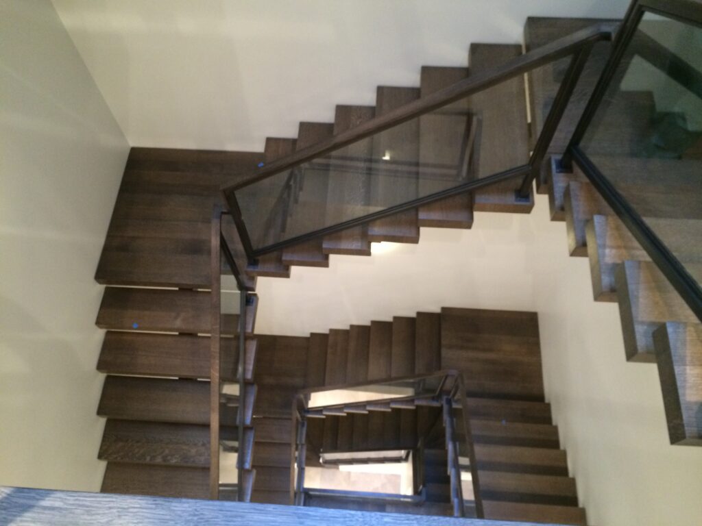 Stunning Spiral Stair Designs - Custom Home Builder